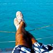 Hairy legs and blue sea